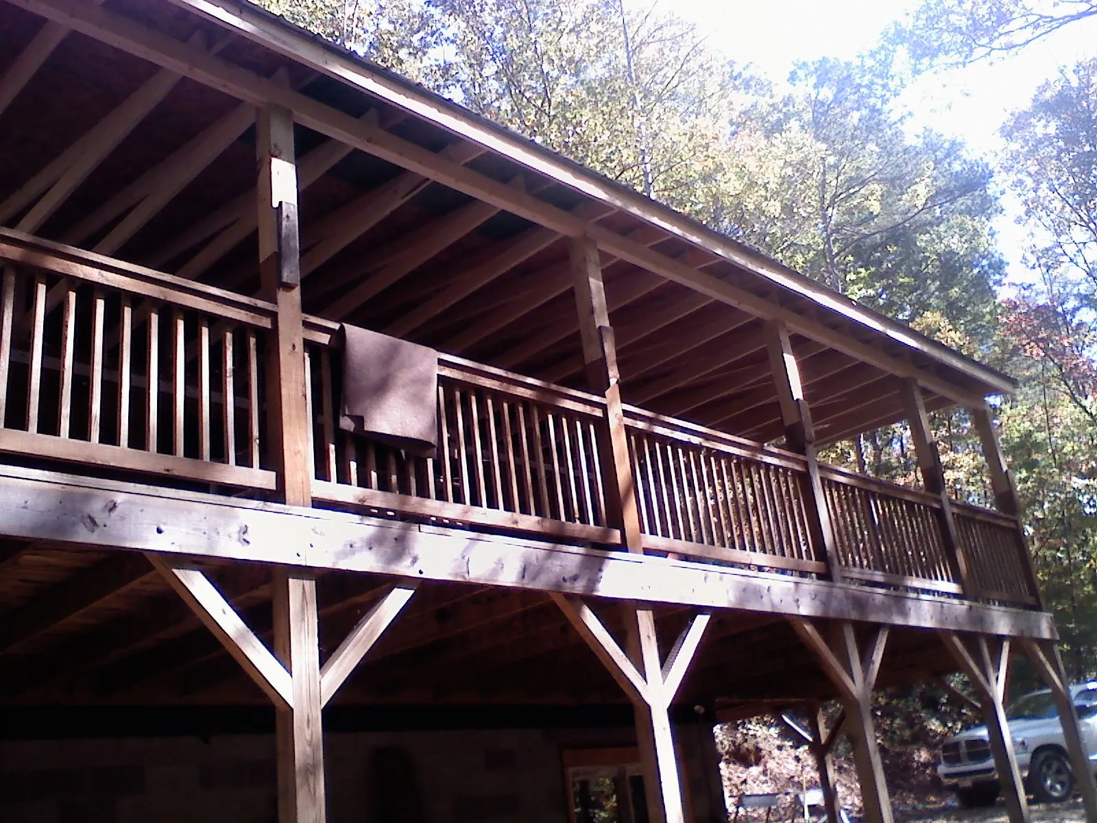 Timber framing under a new elevated porch and deck — Roof Leak Repair in Eglon by Roofing Brothers
